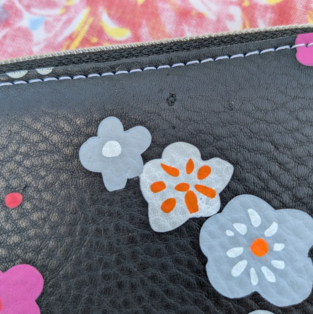 Wallet with Flowers on Black Background Pink Interior Designers Guild